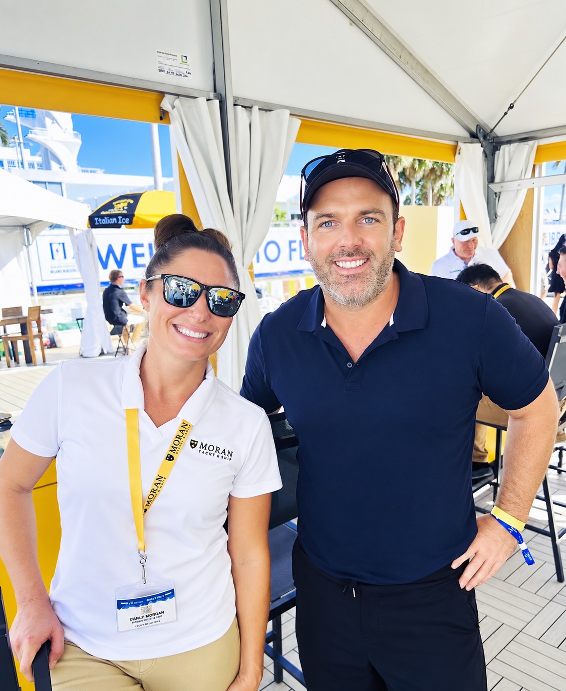 Chris Stokes with a client at a yacht show
